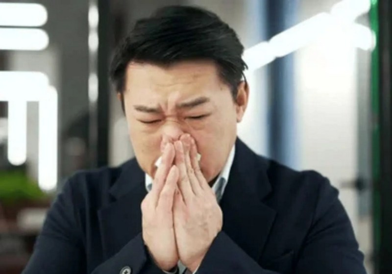 Chinese man with sneezing problem