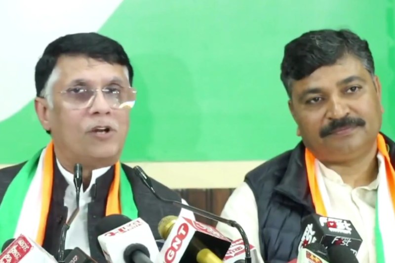 Congress leader Pawan Khera and Tikaram Julie