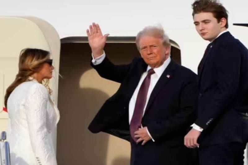 Trump arrives in Washington with Melania