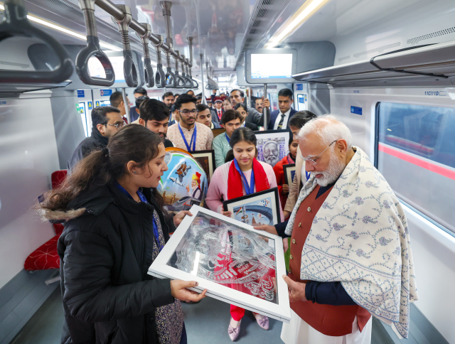 PM Modi travels on Namo Bharat Train