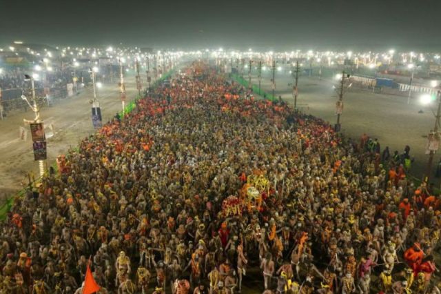 Naga Sadhus arriving at the Sangam chanting 'Har Har Mahadev'