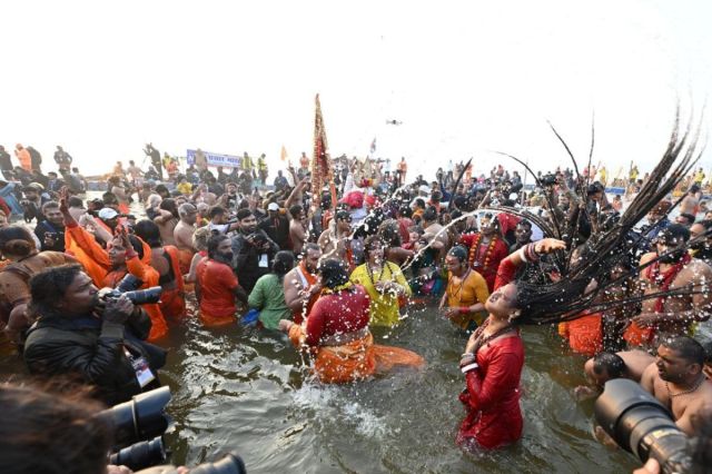 Crowd watching Kinnar Akhada saints bathe