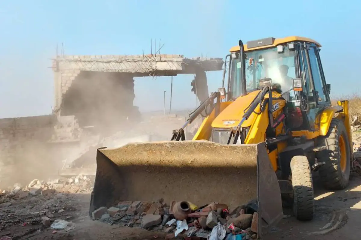 Bulldozers on Encroachment