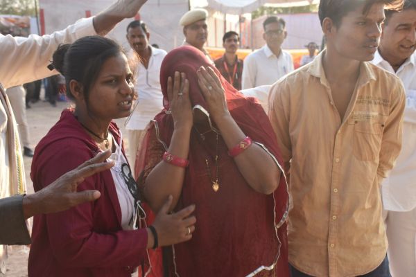 Angry over non-fulfillment of demands for punishment, job and compensation to those accused of son's murder.
 father climbed on the water tank