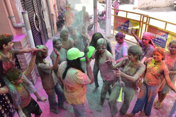 Every body and mind drenched in showers of colors