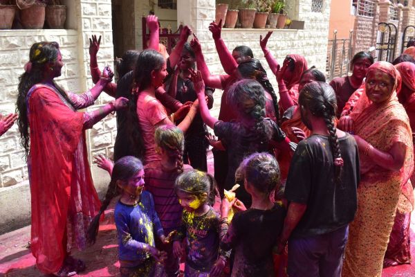 Every body and mind drenched in showers of colors