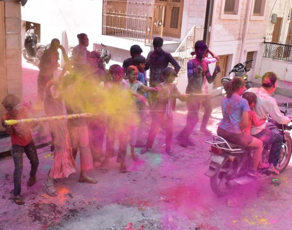 Every body and mind drenched in showers of colors