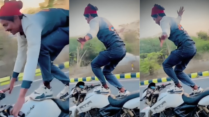 बाइक पर खड़े होकर स्टंट
