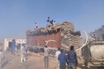 Fire in a parked truck full of peanuts, many bags burnt