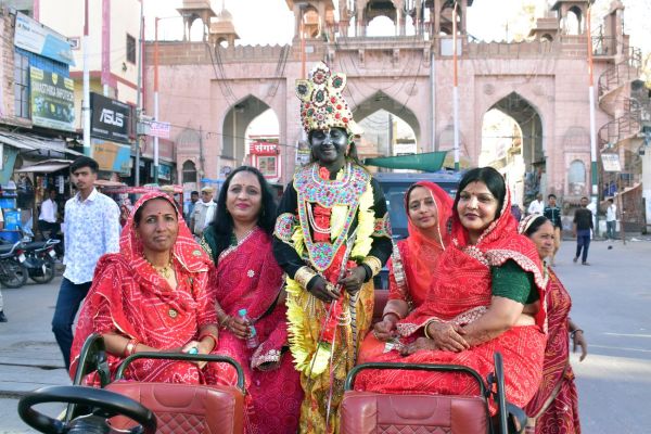 Grand procession of Gangaur with royal attire, festive cheer in the city