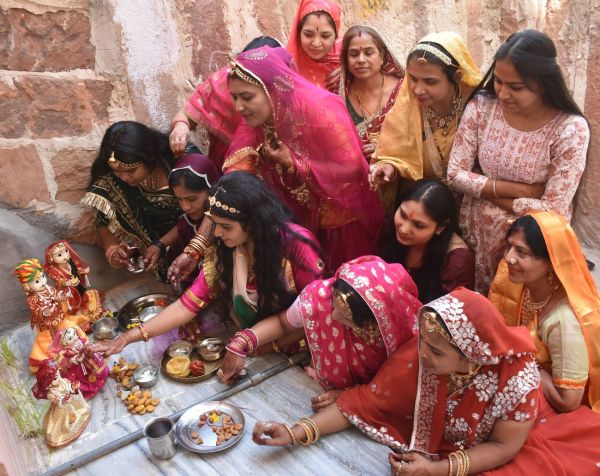 Grand procession of Gangaur with royal attire, festive cheer in the city