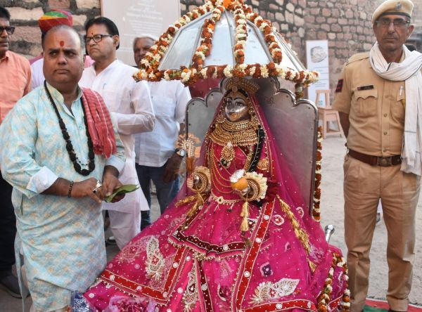 Grand procession of Gangaur with royal attire, festive cheer in the city