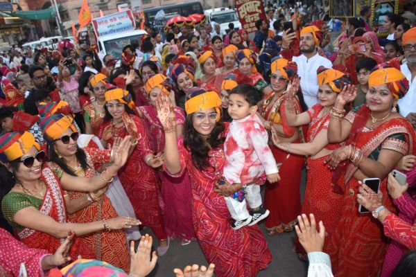 Grand procession of Gangaur with royal attire, festive cheer in the city