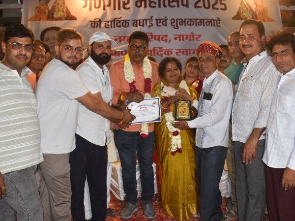 Grand procession of Gangaur with royal attire, festive cheer in the city