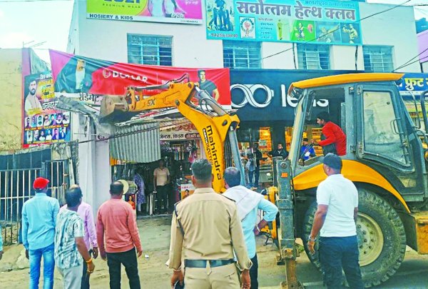 JCB used to remove encroachment