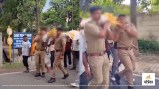 Soldiers carrying bier on their shoulders in UP
