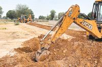 Bulldozer action on illegal colonies (Photo - Patrika)