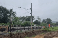 mp heavy rain ohe cable falls on railway track trains stalled betul