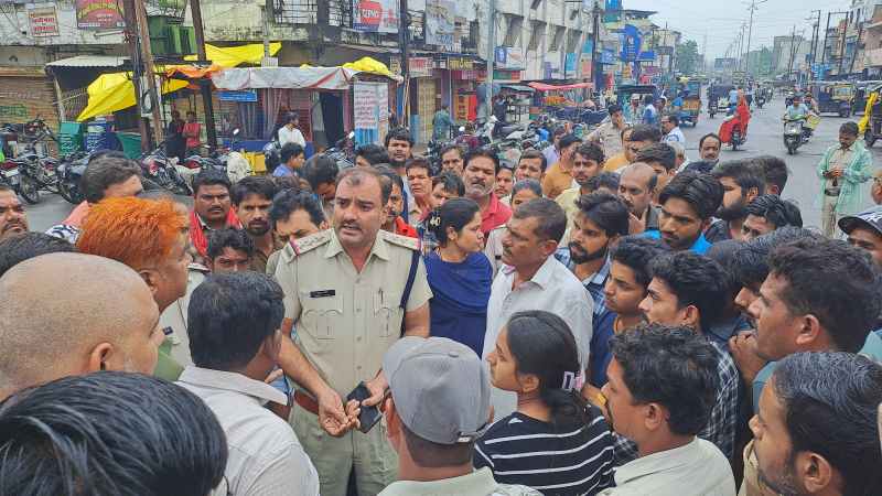A person committed suicide by hanging himself, family members alleged that the Sarpanch and other people had beaten up his son, hence they were in panic