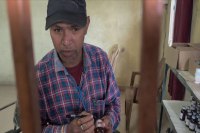 Peon distribute medicine