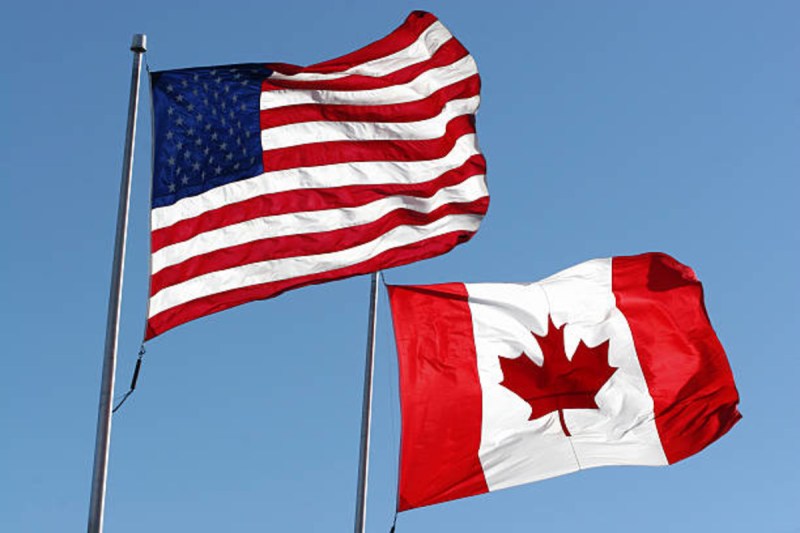 American and Canadian flags