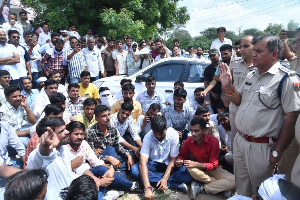 sat on dharna outside private hospital