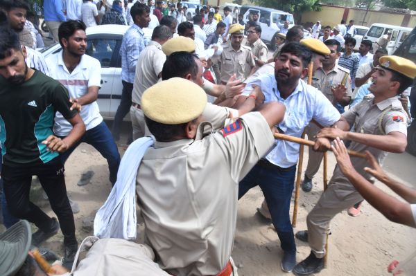 sat on dharna outside private hospital