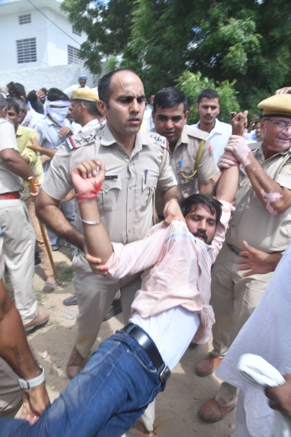 sat on dharna outside private hospital
