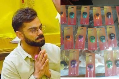 विराट कोहली हाथ में जाप काउंटर पहने हुए।