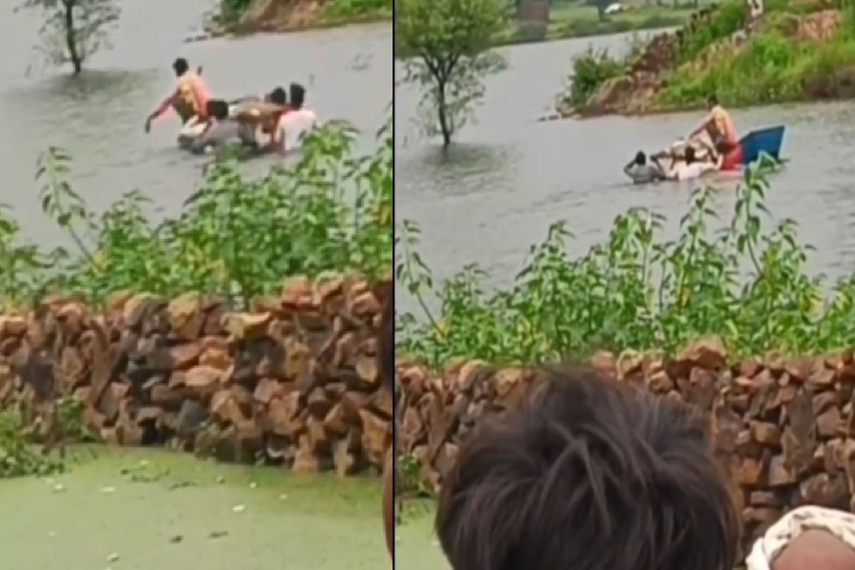 Child funeral procession passing flood video viral heavy rain mp news