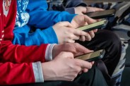 Kids using smartphones