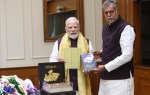 MP Minister Prahlad Patel met with PM Narendra Modi