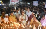 Digvijay Singh continued to smile at the candlelight vigil over the deaths of innocents