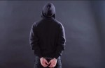 Handcuffed man