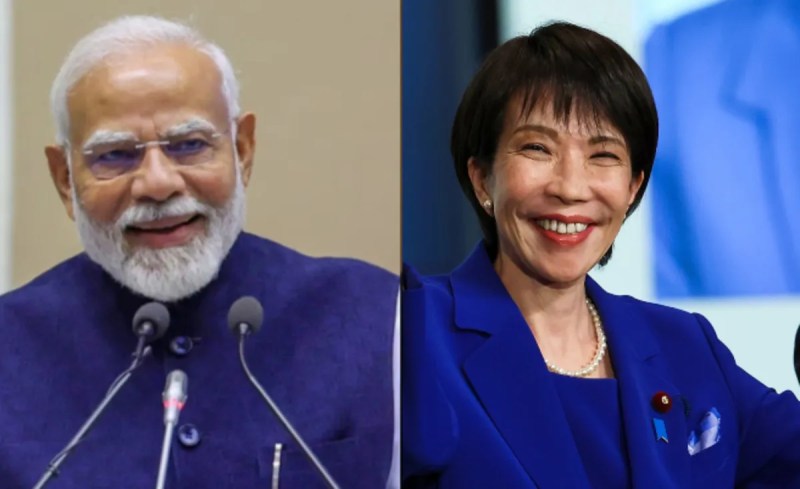 Indian PM Narendra Modi talks to Japanese PM Sanae Takaichi