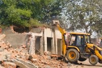 bulldozer action illegal shops demolished mp high court alampur