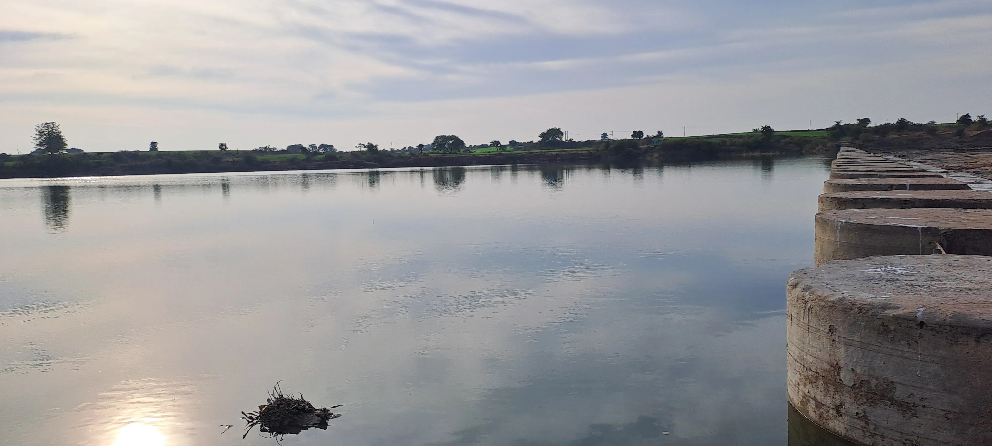 The river's water level is falling rapidly due to irrigation and water leaking from dam gates.