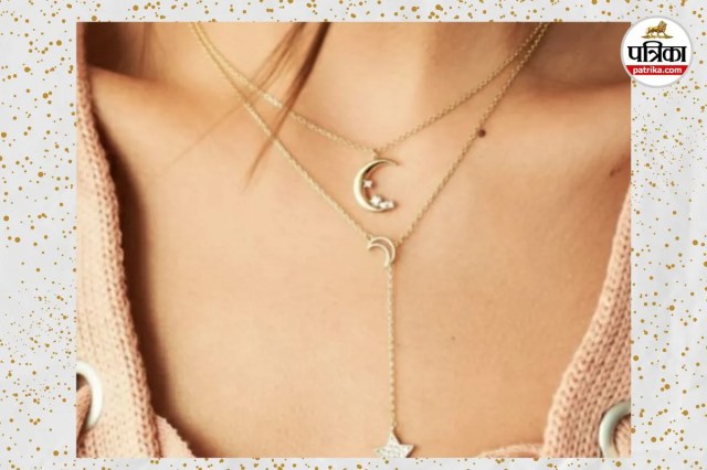 Multi-layer star moon necklace,  Layered chain jewelry trend.

