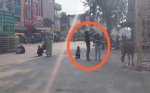 When stopped from setting up his cart on the main road, a vegetable vendor attempted suicide by pouring petrol on himself and his son.