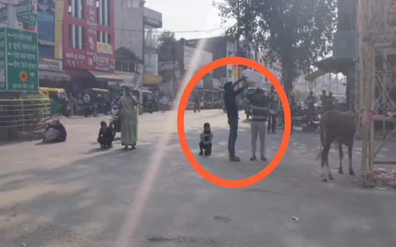 When stopped from setting up his cart on the main road, a vegetable vendor attempted suicide by pouring petrol on himself and his son.