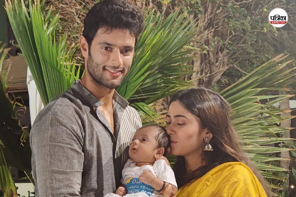 Shivam Dube with his wife and child