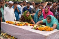 Indian Fisherman Returns In Coffin