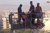 Jaipur Fire in 10 Storey Building 8 Trapped on Terrace Elderly Woman Rescued by Crane 200 Inside