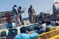 High-voltage drama at Badi Chaupar in Jaipur Man climbs car roof smokes and demands ban on bidi-cigarettes