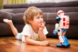 Child playing with AI toy