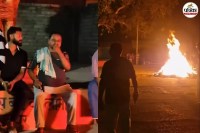 bihar news, holi 2026, holika dahan, gopal mandal, gopal mandal viral video, People near a fire at night.