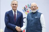 Indian Prime Minister Narendra Modi with Canadian PM Mark Carney