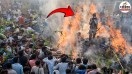 sambhal man jumps in holika fire rescued