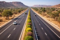 Rajasthan Highways, New Highways in Rajasthan, Rajasthan Highway Project, Rajasthan highway modernization, India expressway, modern six lane highway, rural highway landscape India, road infrastructure development, world bank highway project, scenic highway desert landscape, high speed road network India, traffic on modern expressway, futuristic highway design, Indian road construction update, highway aerial view, transportation infrastructure India, smooth asphalt highway, green median highway design