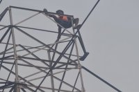 Man climbed on tower